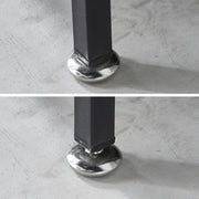 Close-up of the adjustable leg base of the Fabric 8-Drawer Dresser for stability and support.