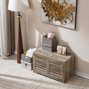 Rustic Storage Trunk Shoe Bench displayed in an entryway with decorative storage boxes and a stylish lamp.