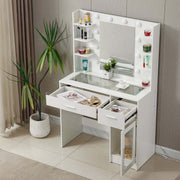 LED Vanity Desk with Charging Station, see-through glass top and illuminated mirror for cosmetics display.