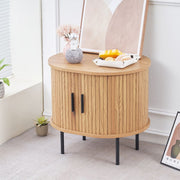 Sliding tambour door mechanism on round side table with storage