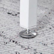 Adjustable leveling foot pad on white computer desk metal leg for stability
