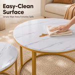 Easy-clean white marble-effect tabletop being wiped with a cloth