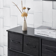 Fabric 8-Drawer Dresser with wood top featuring decorative vase and books, ideal for stylish storage.