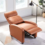 Adjustable manual recliner chair in a cozy room with natural light and a floor lamp.