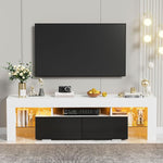 White and black LED TV stand with warm-lit glass shelves and black drawers