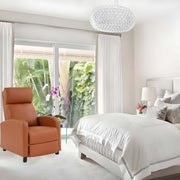 Stylish manual recliner chair in a cozy bedroom setting, featuring a warm brown color and inviting decor.
