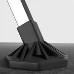 Close-up of the base of a Foldable Clothes Rail, featuring a sturdy black design for stability.