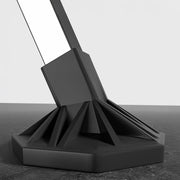 Close-up of the base of a Foldable Clothes Rail, featuring a sturdy black design for stability.