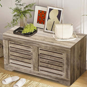 Rustic Storage Trunk Shoe Bench with decorative items and plants in a stylish living space.