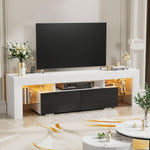 White and black TV unit with warm LED shelves beneath a large television