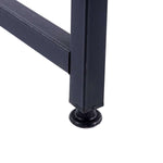 Close-up of adjustable foot and black metal frame on the 120cm office desk