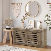 Rustic Storage Trunk Shoe Bench styled in a cozy living room with plants and decor on top.