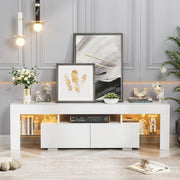 White TV console with two drawers and warm LED-lit side shelves in a bright lounge