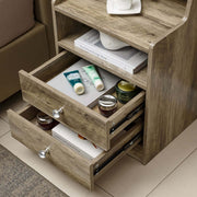 Modern LED Bedside Table with Drawers showcasing storage of cosmetics and books.