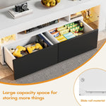 Modern Floating LED TV Stand with large capacity drawers for storing items, including video games and snacks.