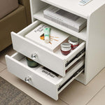 Modern LED Bedside Table with drawers showcasing books and beauty products for stylish organization.