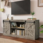Farmhouse Sliding TV Stand in a stylish living room setting with a television mounted above it.