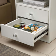 Modern LED Bedside Table with drawers showing organized items and decorative elements in a clean, modern design.