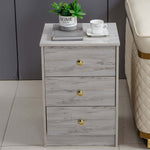 Modern 3-Drawer Nightstand with Gold Handles featuring a minimalist design and practical storage.