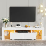White LED TV unit with warm yellow lighting beneath a wall-mounted television