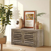 Rustic Storage Trunk Shoe Bench in a stylish living room with plants and decorative items, perfect for organization.