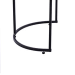 Detail of the base of an Oval Black Marble Coffee Table showcasing its stylish black metal frame.