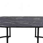 Oval Black Marble Coffee Table view showcasing the elegant black marble surface and sleek metal legs.