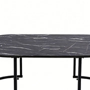Oval Black Marble Coffee Table view showcasing the elegant black marble surface and sleek metal legs.