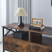 Industrial TV Stand with stylish lamp and decorative items, ideal for enhancing living room decor.