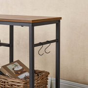 Close-up of practical side hooks on industrial TV stand for headphones storage