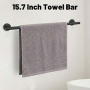 Matte Black Bathroom Towel Rack Set - 15.7 Inch Towel Bar with towel hanging on it.
