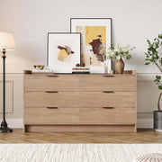 6-Drawer Chest of Drawers showcased in a stylish living room with artwork and plants.