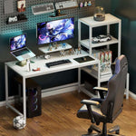 White gaming computer desk setup with dual monitors and ergonomic chair