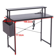 Modern computer desk with power outlets and a side storage pouch, ideal for home office or study setup.