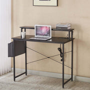Modern computer desk with power outlets, featuring a laptop and coffee cup on a sleek, minimalist design.