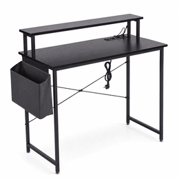 Modern computer desk featuring power outlets and an attached storage bag for added convenience.