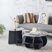 Modern Glass Nesting Coffee Table set placed in a stylish living room with decorative elements and a cozy sofa.