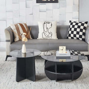 Modern Glass Nesting Coffee Table set in a stylish living room with decorative pillows and a sleek sofa.