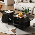 Modern Glass Nesting Coffee Table set in a stylish living room with sleek black finish and decorative items.