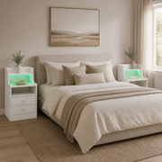 Two modern white LED bedside tables with drawers styled on either side of a contemporary South African bedroom.