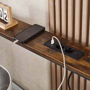 Narrow Sofa Table with Charging Station showing charging ports and mobile phone on wood surface.