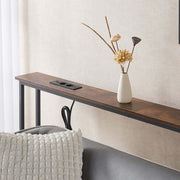 Narrow Sofa Table with Charging Station displaying a minimalist design, power outlets, and a decorative vase.