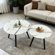 Top view of faux marble finish on round nesting coffee table set