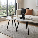 Space-saving nesting coffee table set with black metal legs on living room rug