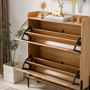Rattan Flip-Top Shoe Cabinet featuring elegant storage slots in a stylish entryway setting.