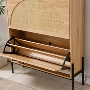Rattan Flip-Top Shoe Cabinet showing open storage space for shoes and rattan detailing in a stylish entryway.