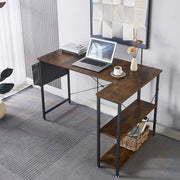 Reversible L-Shaped Computer Desk with a laptop, shelves, and rustic wood finish in a modern home office setting.