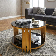 Round Glass Coffee Table in modern lounge with gold geometric frame and black glass top.
