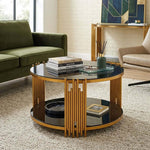 Round Glass Coffee Table featuring a gold geometric frame and black tempered glass in a stylish living space.