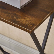 Close-up of the wooden surface of a rustic folding TV tray table with a sleek design and minimal assembly required.